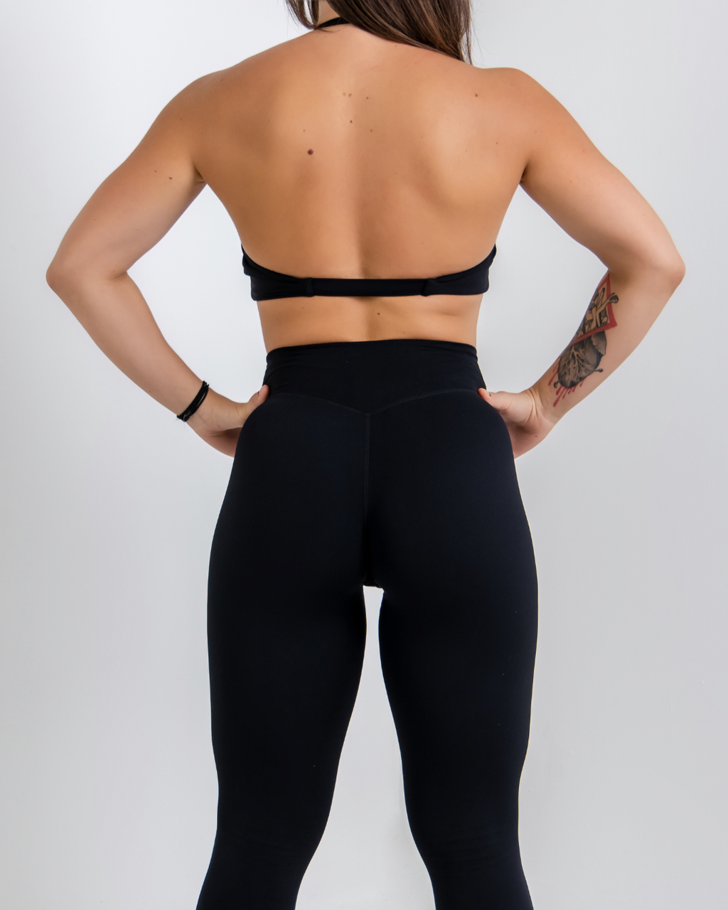 Stealth Black Vital flow Sports Bra by Lacobra with supportive fit for gym workouts, running, and training.