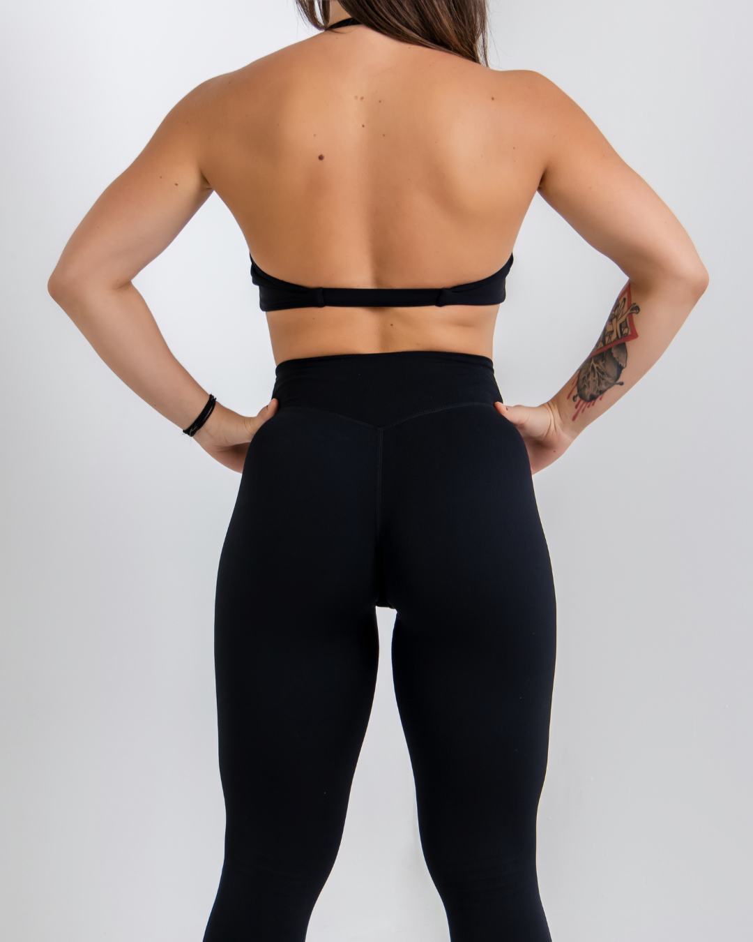 Stealth Black Vital flow Sports Bra by Lacobra with supportive fit for gym workouts, running, and training.