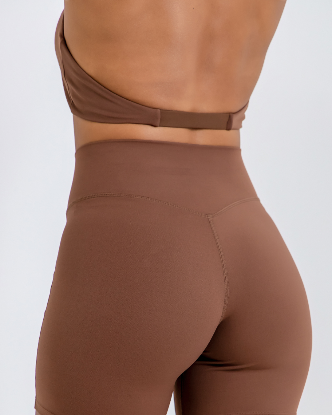 Forge Brown Vital flow Sports Bra by Lacobra with supportive fit for gym workouts, running, and training.