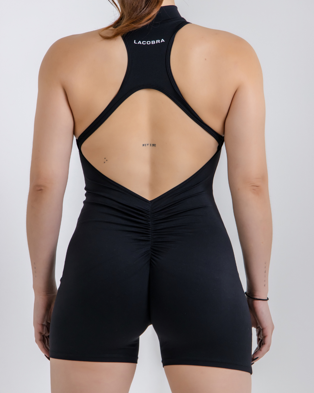 Vital Flow jumpsuit for women, form-fitting activewear designed with stretch fabric for comfort, support, and flexibility during workouts, training, and everyday athletic wear.