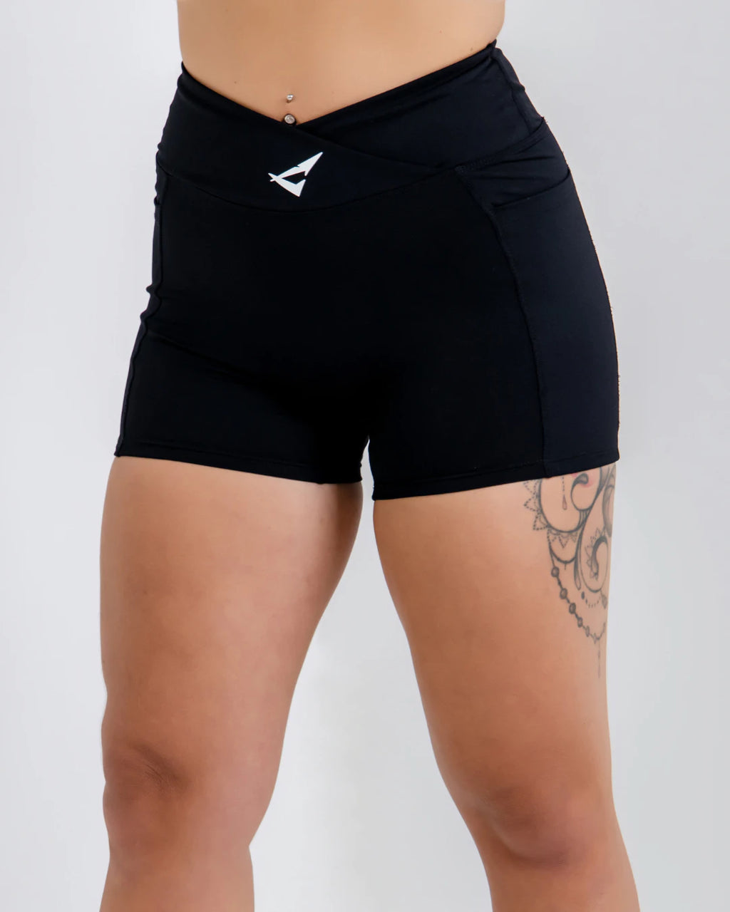 Vital Flow Pocket Shorts in Black Stealth, lightweight breathable activewear shorts with secure side pockets, designed for gym workouts, running, and everyday fitness training.