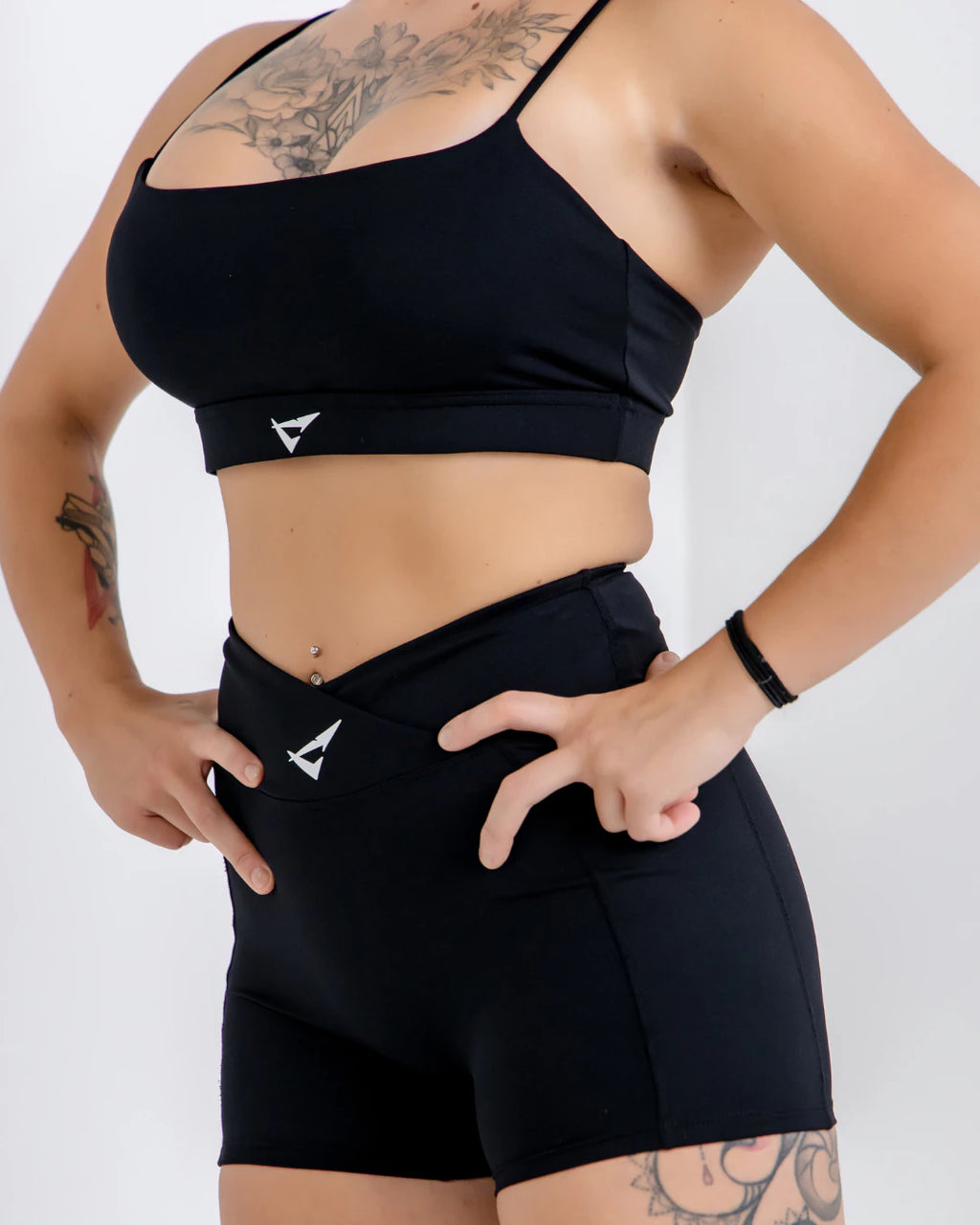 Vital Flow Pocket Shorts in Black Stealth, lightweight breathable activewear shorts with secure side pockets, designed for gym workouts, running, and everyday fitness training.